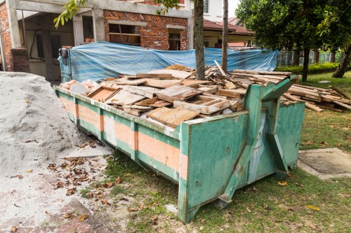 Commercial waste removal van parked in Blackwall street