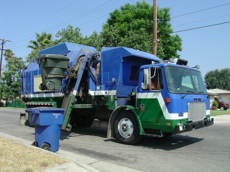 Crew conducting on-site training for waste collection